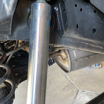 BST Motorsports - Rear shocks were loose and still had the knock off sticker residue still on it. - Auto Repair Near Me - San Diego, California BST Motorsports - Rear shocks were loose and still had the knock off sticker residue still on it. - Auto Repair Near Me - San Diego, California