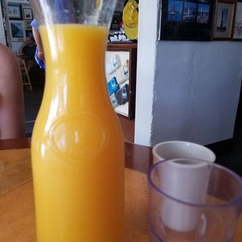 Lighthouse Cafe - Liter of fresh squeezed orange juice. - Breakfast & Brunch Near Me - Sanibel, Florida Lighthouse Cafe - Liter of fresh squeezed orange juice. - Breakfast & Brunch Near Me - Sanibel, Florida