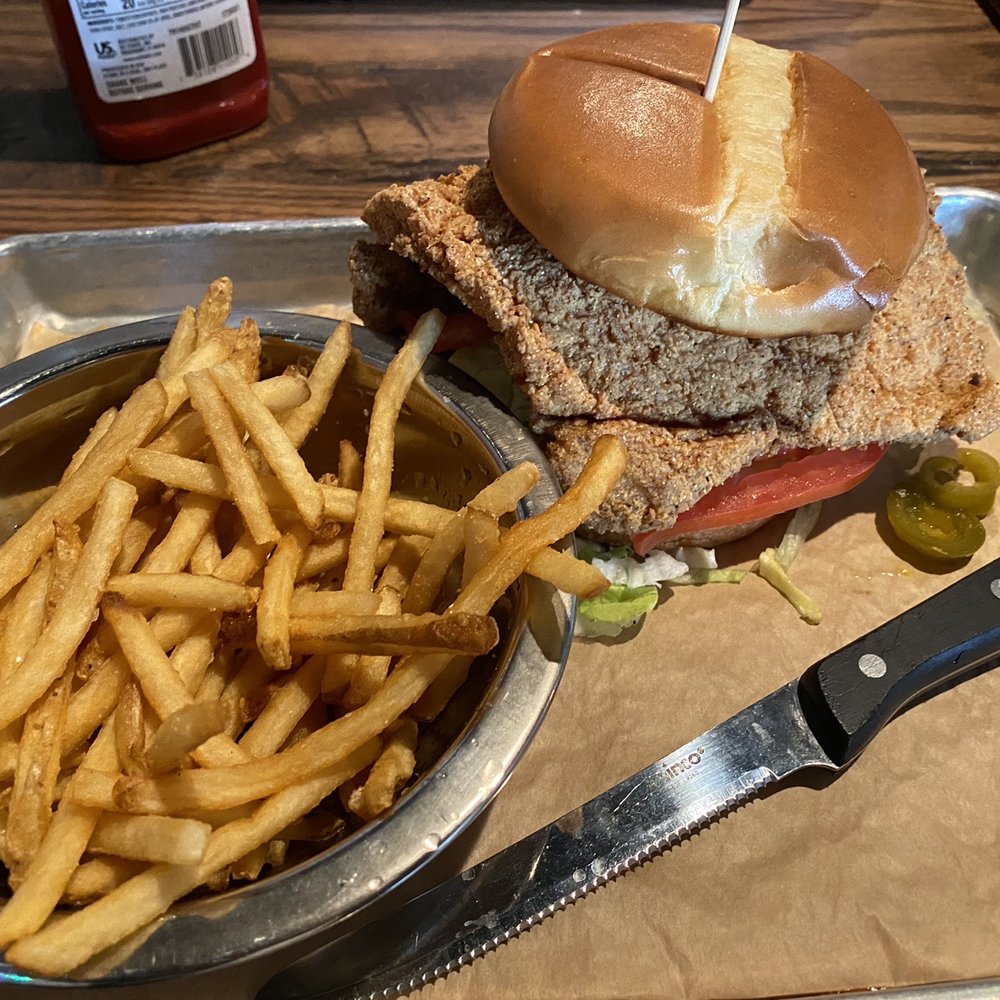 Squid Ink Eclectic Eats & Drinks - Chronic Pork Chop Sandwich & fries - Gastropubs Near Me - Mobile, Alabama