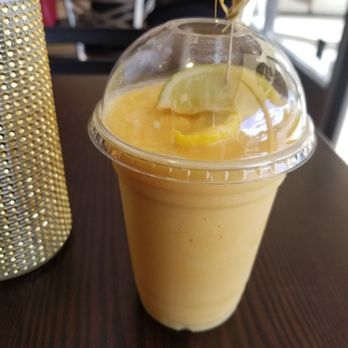 Rootz Bar N Cafe - Mango slushie. Sadly I cant recommend it. - Caribbean Near Me - Tamarac, Florida