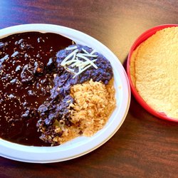 El Cantaro - Authentic Mole Negro Oaxaca Style Plate and corn tortillas