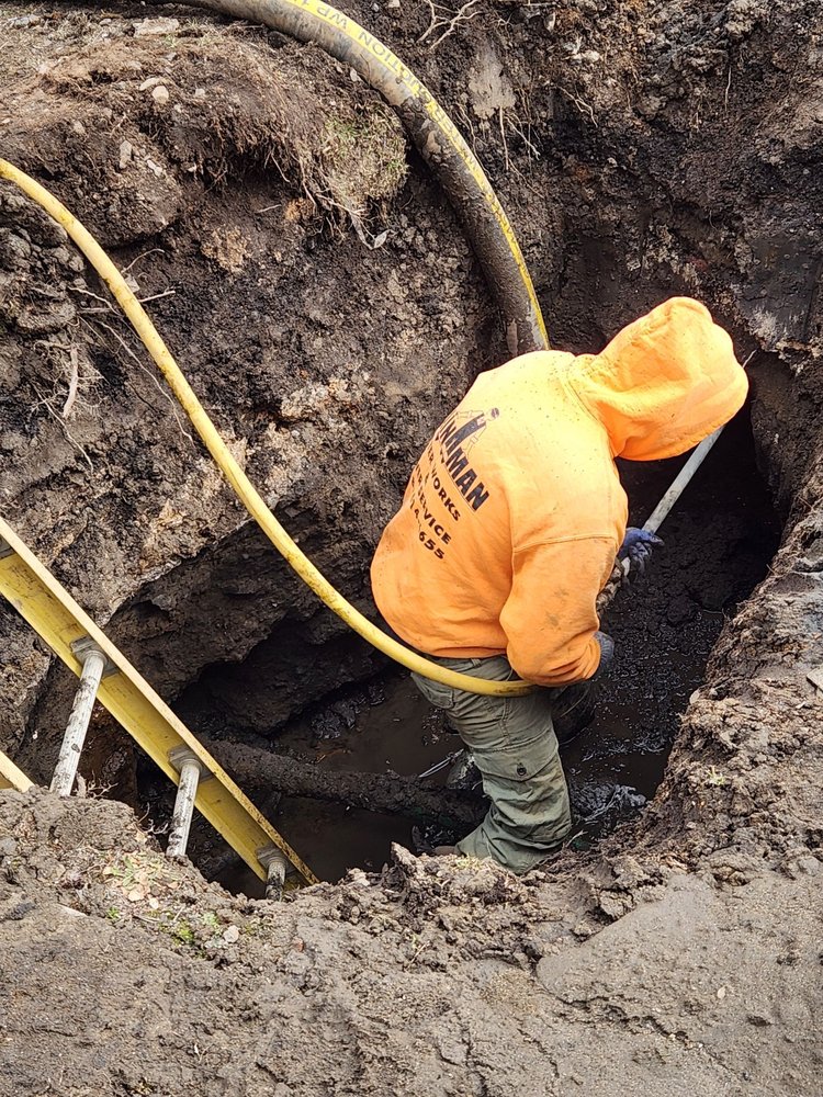 Slide of Main Man Water Main & Sewer Service