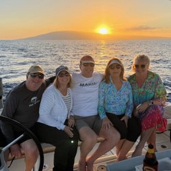 Kainani Sails Maui Sailing Charters - On the boat with just before Sunset with the island of Lanai behind us.