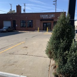 a parking lot in front of a building