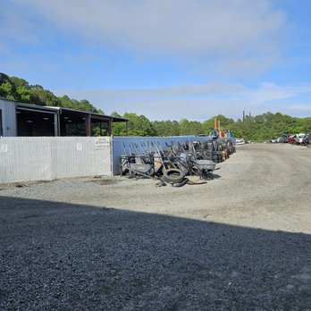 Pick-n-Pull - Wheel barrel storage racks (free to use). In the gated area, they have their processing area. - Auto Parts & Supplies Near Me - Virginia Beach, Virginia Pick-n-Pull - Wheel barrel storage racks (free to use). In the gated area, they have their processing area. - Auto Parts & Supplies Near Me - Virginia Beach, Virginia