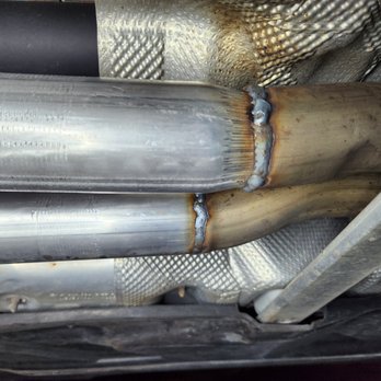 Muffin Muffler - Tapered pipe shoved into  sotck pipe - Auto Repair Near Me - Austin, Texas