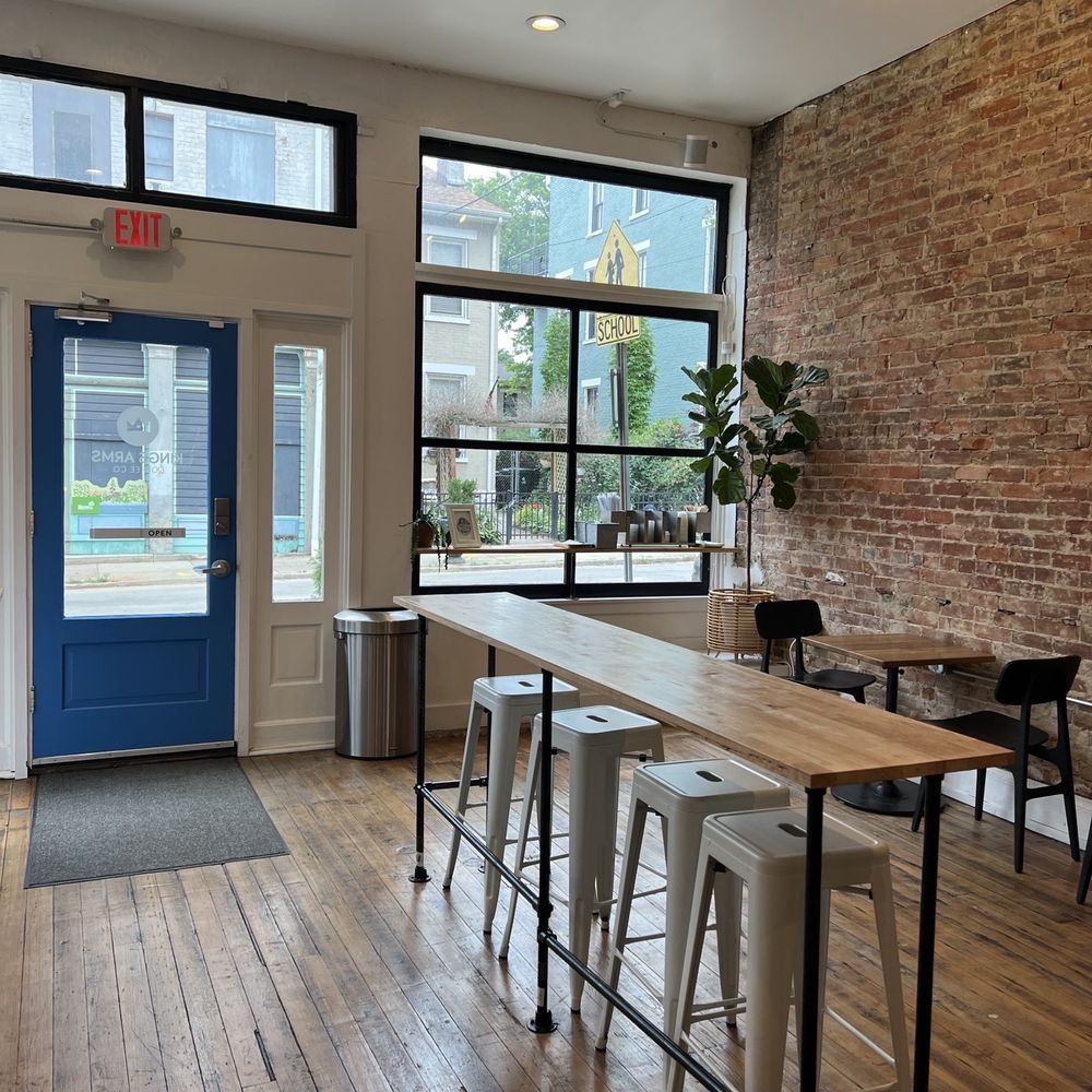 Kings Arms Coffee - tables and stools in front of large windows - Coffee & Tea Near Me - Cincinnati, Ohio Kings Arms Coffee - tables and stools in front of large windows - Coffee & Tea Near Me - Cincinnati, Ohio