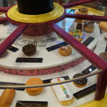 Voodoo Doughnut - Rolling display of doughnuts - Bakeries Near Me - Orlando, Florida Voodoo Doughnut - Rolling display of doughnuts - Bakeries Near Me - Orlando, Florida