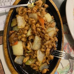 Silkway Halal Cuisine - Chicken pieces on iron skillet