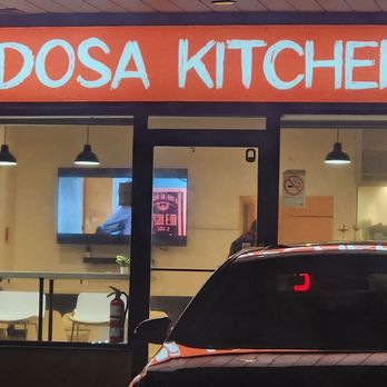 Dosa Kitchen - a car parked in front of the restaurant - Indian Near Me - Scarborough, Ontario