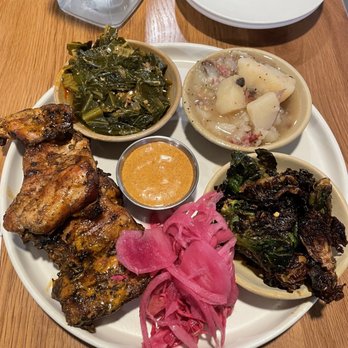 Ray Ray’s Hog Pit - Jerk Chicken, Collard greens, Brussels sprouts, and German potato salad - Barbeque Near Me - Granville, Ohio Ray Ray’s Hog Pit - Jerk Chicken, Collard greens, Brussels sprouts, and German potato salad - Barbeque Near Me - Granville, Ohio