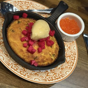 Good God Nadine's - Skillet cornbread w radish and trout row on the side - Bars Near Me - Houston, Texas Good God Nadine's - Skillet cornbread w radish and trout row on the side - Bars Near Me - Houston, Texas