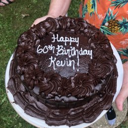 Chocolate cake with chocolate icing and raspberry filling.