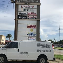 Their Sign on Terry Parkway and One of Their Work Trucks Their Sign on Terry Parkway and One of Their Work Trucks