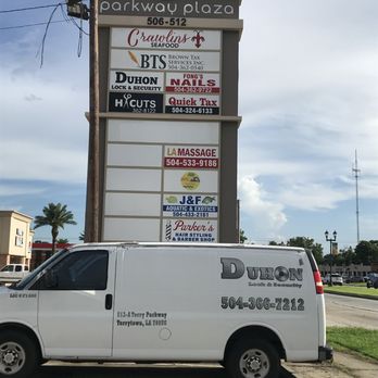 Duhon Lock & Security - Their Sign on Terry Parkway and One of Their Work Trucks - Keys & Locksmiths Near Me - Terrytown, Louisiana Duhon Lock & Security - Their Sign on Terry Parkway and One of Their Work Trucks - Keys & Locksmiths Near Me - Terrytown, Louisiana