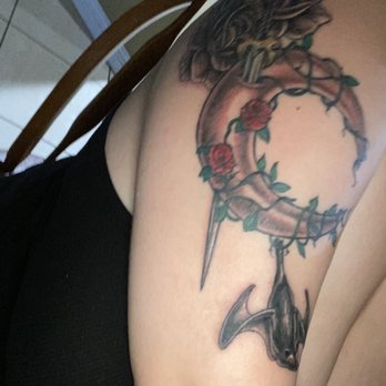 Future Tattoo & Body Piercing - After; added detail, fixed the sword, added shading and highlights to give it some depth - Tattoo Near Me - Fullerton, California Future Tattoo & Body Piercing - After; added detail, fixed the sword, added shading and highlights to give it some depth - Tattoo Near Me - Fullerton, California