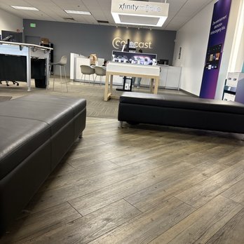 Xfinity Store by Comcast - Dirty at the bottom of the bench. Workers at the back just chatting. - Television Service Providers Near Me - Petaluma, California