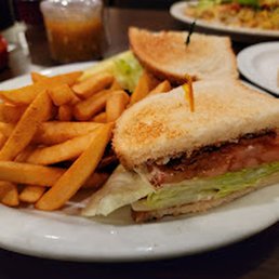 BLT sandwich and fries. BLT sandwich and fries.