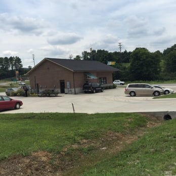 Subway - a view of a parking lot with cars parked in it - Sandwiches Near Me - Carthage, Tennessee