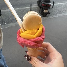 mango and raspberry sorbet with vanilla macaron. mango and raspberry sorbet with vanilla macaron.