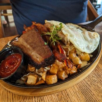 Pradera Brunch - Applewood smoked brisket skillet with over easy eggs bacon and sausage - that brisket was so good - Breakfast & Brunch Near Me - Baldwin Park, California