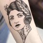 Photo of orange blossom tattoo studio