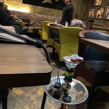 Arabica Lounge - a hooket and a hooket on a table - Hookah Bars Near Me - Montreal, Quebec Arabica Lounge - a hooket and a hooket on a table - Hookah Bars Near Me - Montreal, Quebec
