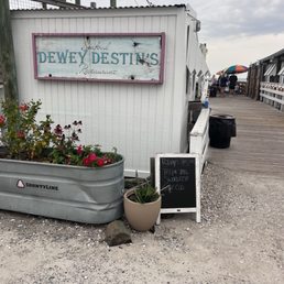 Exterior outside entrance of Dewey Destin Seafood - Don't let the entrance fool you!!!!! - Destin, Florida Exterior outside entrance of Dewey Destin Seafood - Don't let the entrance fool you!!!!! - Destin, Florida