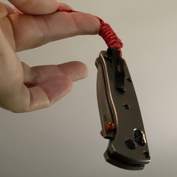 Benchmade mini-bugout with titanium scales from Unlimited Bladeworkz Benchmade mini-bugout with titanium scales from Unlimited Bladeworkz
