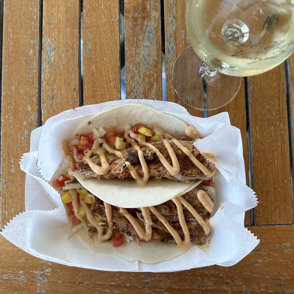Hit The Road Jack - Mahi mahi tacos and a glass of white wine. - Food Trucks Near Me Hit The Road Jack - Mahi mahi tacos and a glass of white wine. - Food Trucks Near Me