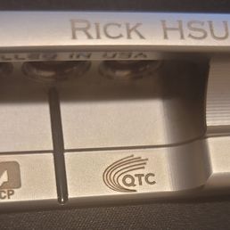 Scotty Cameron Putter with 2 logos and name added. Scotty Cameron Putter with 2 logos and name added.