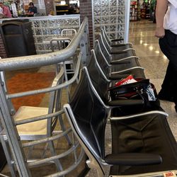 Omaha Airport Authority - Steel railing next to seats ~ Safety violation