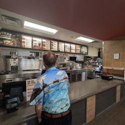 Arby's - Front counter was spick and span, he's either read menu.