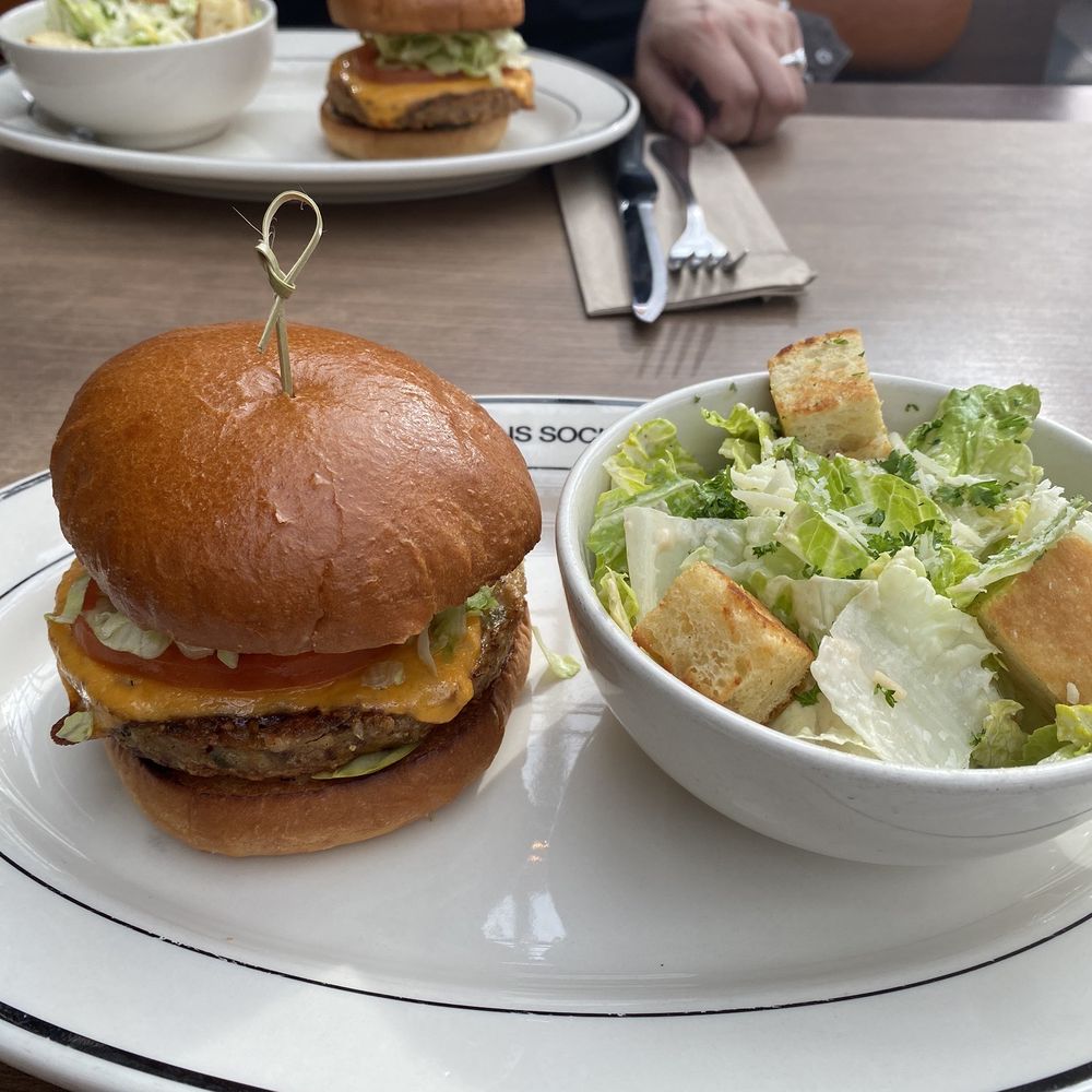 Veggie burger with Caesar salad