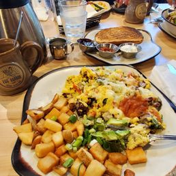 The build your own scrambler. Family ate chilaquiles and an omelet. Everyone enjoyed their breakfast
