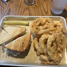 Chicken salad sandwich with walnuts and grapes in the salad, pickle slice and of course, the homemade onion rings Chicken salad sandwich with walnuts and grapes in the salad, pickle slice and of course, the homemade onion rings