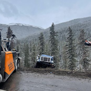 Mountain Recovery - Recovering a Semi from side of a hill - Towing Near Me - Wolcott, Colorado
