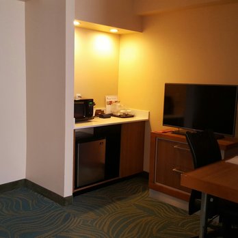 SpringHill Suites by Marriott Orlando Lake Buena Vista South - Mini refrigerator, coffee maker, microwave and television and desk area - Hotels Near Me - Kissimmee, Florida SpringHill Suites by Marriott Orlando Lake Buena Vista South - Mini refrigerator, coffee maker, microwave and television and desk area - Hotels Near Me - Kissimmee, Florida
