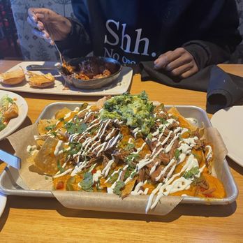 Twin Peaks - Brisket Nachos - Sports Bars Near Me - Schererville, Indiana Twin Peaks - Brisket Nachos - Sports Bars Near Me - Schererville, Indiana
