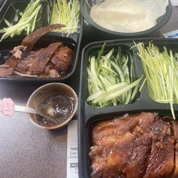 Two boxes of whole duck with a tiny sauce ! It's way too less Two boxes of whole duck with a tiny sauce ! It's way too less