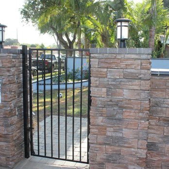 Sammy Outdoor Design - Front entrance - Landscaping Near Me