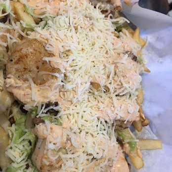 Los Tacos - Surf n turf fries with way too much of whatever sauce that is, with very little flavor. - Mexican Near Me - Temecula, California