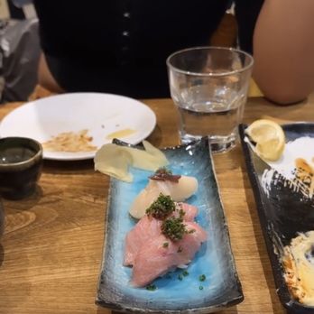 Kiraku - Otoro with truffle nigiri and scallop nigiri - Tapas/Small Plates Near Me - Berkeley, California Kiraku - Otoro with truffle nigiri and scallop nigiri - Tapas/Small Plates Near Me - Berkeley, California