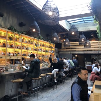 Peacekeeper - bar area with open air skylight - Cocktail Bars Near Me - San Francisco, California Peacekeeper - bar area with open air skylight - Cocktail Bars Near Me - San Francisco, California