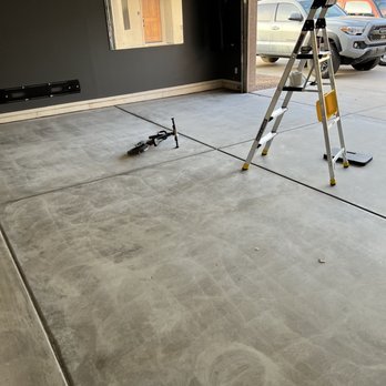 Americas Stone Restoration - a concrete floor being installed in a garage - Flooring Near Me Americas Stone Restoration - a concrete floor being installed in a garage - Flooring Near Me