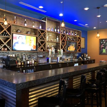 Blue Moon Pizza - Bar area with many booths - Pizza Near Me - Fort Myers, Florida Blue Moon Pizza - Bar area with many booths - Pizza Near Me - Fort Myers, Florida