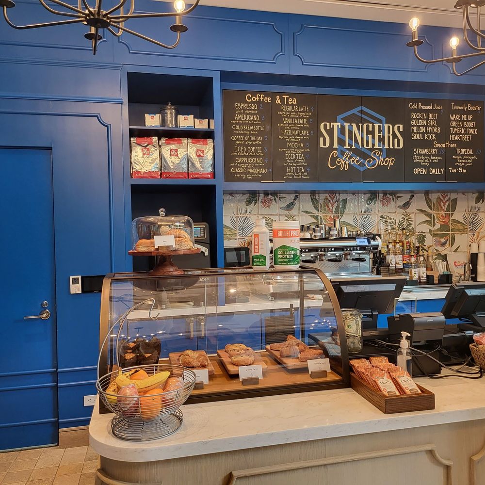 Stingers Coffee Shop - a counter with a variety of pastries - Coffee & Tea Near Me - Delray Beach, Florida Stingers Coffee Shop - a counter with a variety of pastries - Coffee & Tea Near Me - Delray Beach, Florida
