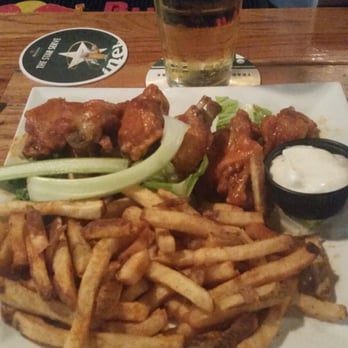 Bello's Pub & Grill - Hot wings with Cajun fries (fresh cut fries dusted with Old Bay). - American Near Me - Newark, New Jersey Bello's Pub & Grill - Hot wings with Cajun fries (fresh cut fries dusted with Old Bay). - American Near Me - Newark, New Jersey