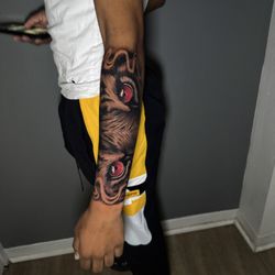 9414 Ink - Tiger eyes done by tattoo artist Drew here at 9414 Ink