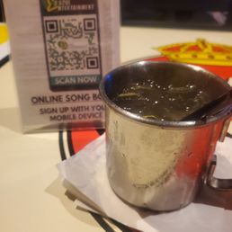 a cup of hot chocolate with a qr code on the side a cup of hot chocolate with a qr code on the side